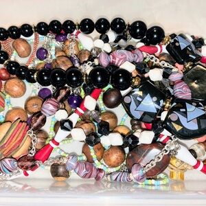 8 Beaded necklace with a multi-coloured beads, featuring a mix of styles